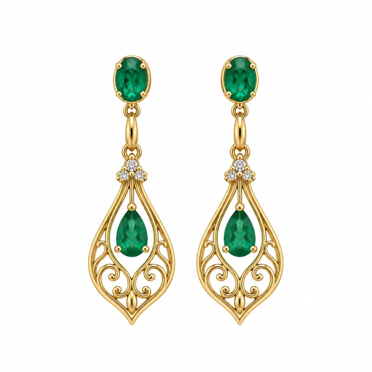 Gold and emerald drop earrings from the illustrative collection